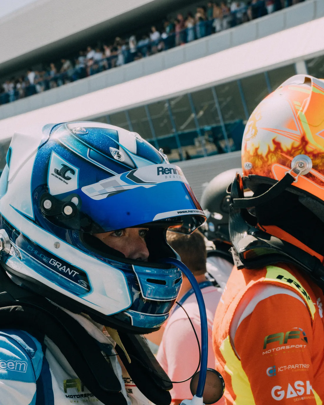 Chloe Grant in her helmet on the grid before the start, among the other drivers